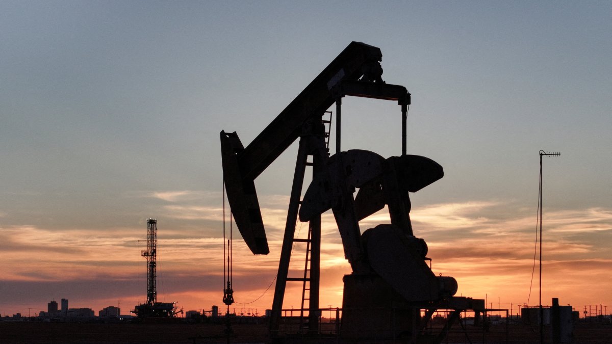A drone view of a pump jack and drilling rig south of Midland, Texas, U.S., June 11, 2025. (Reuters Photo)