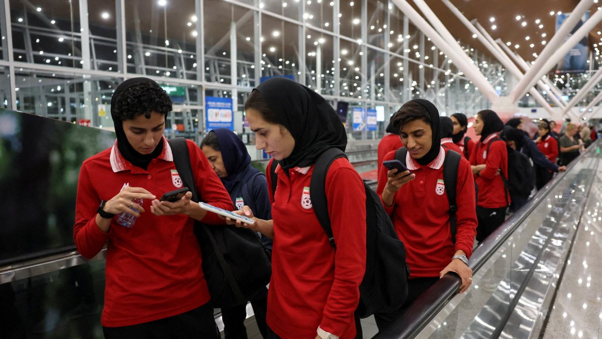 Members of the Iranian women's national team arrive at Terminal 1 of Kuala Lumpur International Airport after attending a match in Group A of the AFC Women's Asian Cup in Australia, Sepang, Malaysia, March 11, 2026. (Reuters Photo)