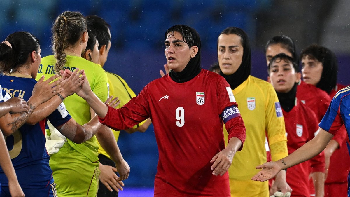 Iran player Zahra Ghanbari (C) greets players of the Philippines following the AFC Women’s Asian Cup Group A match between Iran and the Philippines at Gold Coast Stadium, Gold Coast, Australia, March 8, 2026. (EPA Photo)