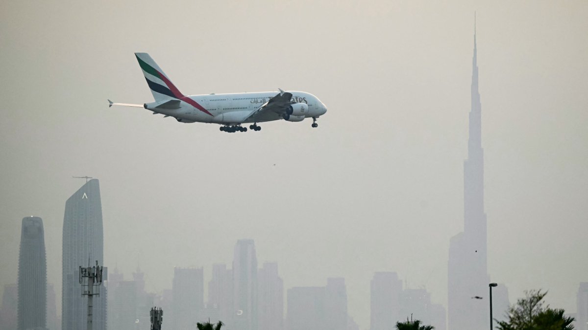 An Emirates Airbus A380 passenger aircraft prepares for landing at Dubai International Airport, Dubai, UAE, March 8, 2026. (AFP Photo)