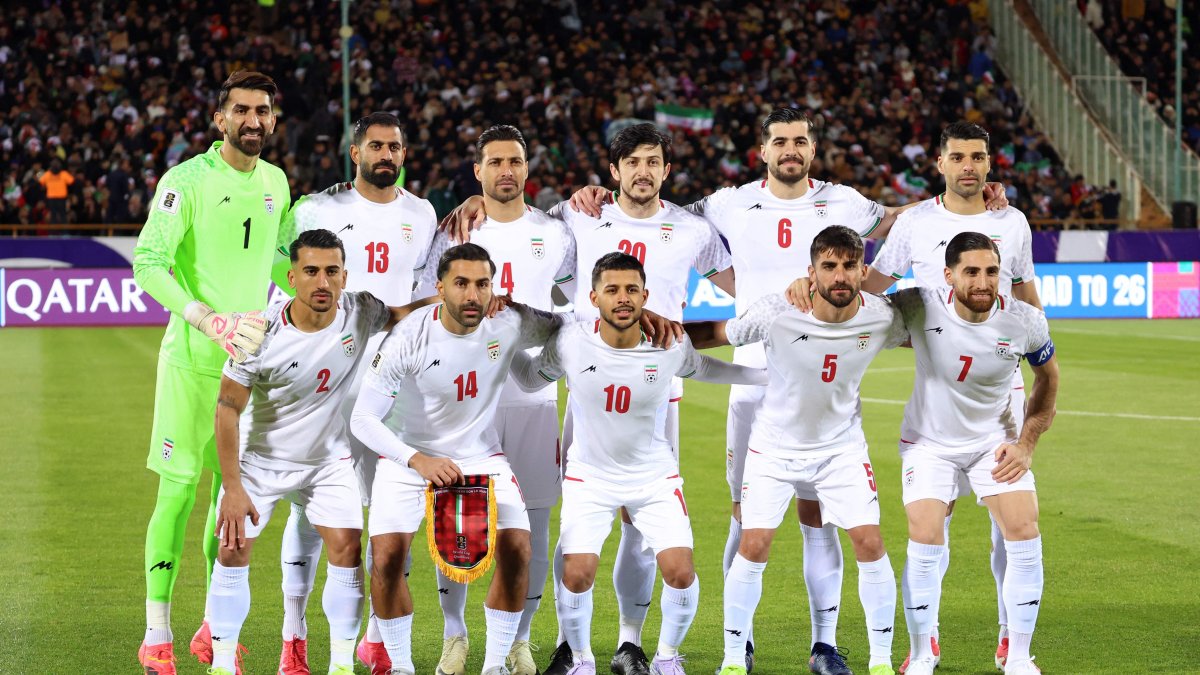 Iran's national football team pose for a group picture before the FIFA World Cup 2026 Asia zone qualifiers match against Uzbekistan, March 25, 2025. (AFP Photo)