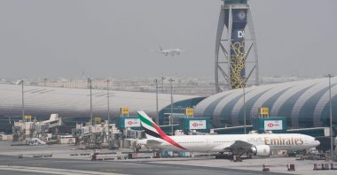 An Emirates Boeing 777 stands at the gate at Dubai International Airport in Dubai, United Arab Emirates, Aug. 17, 2022. (AP Photo)