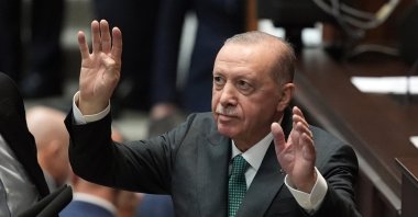 President Recep Tayyip Erdoğan greets party members during the party’s parliamentary group meeting at Parliament, Ankara, Türkiye, March 11, 2026. (AA Photo)