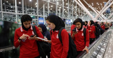Members of the Iranian women's national team arrive at Terminal 1 of Kuala Lumpur International Airport after attending a match in Group A of the AFC Women's Asian Cup in Australia, Sepang, Malaysia, March 11, 2026. (Reuters Photo)