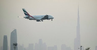 An Emirates Airbus A380 passenger aircraft prepares for landing at Dubai International Airport, Dubai, UAE, March 8, 2026. (AFP Photo)