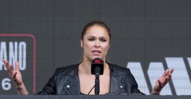 Ronda Rousey speaks at a press conference ahead of her upcoming MMA featherweight bout at Intuit Dome, Inglewood, U.S., March 10, 2026. (Reuters Photo)
