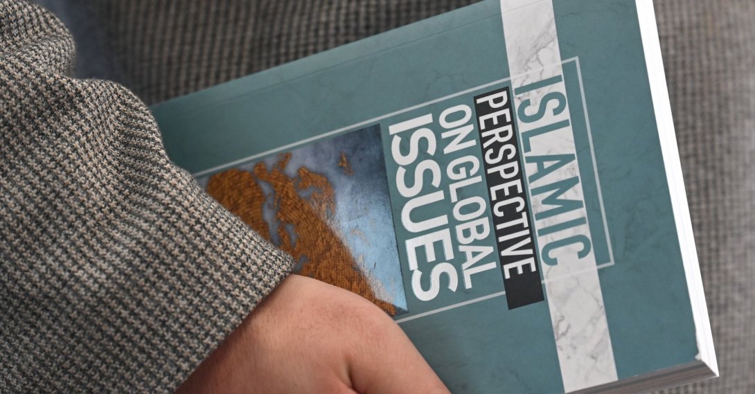 A copy of "Islamic Perspective on Global Issues" on display, highlighting Diyanet’s multilingual publications, Ankara, Türkiye, March 6, 2026. (AA Photo)