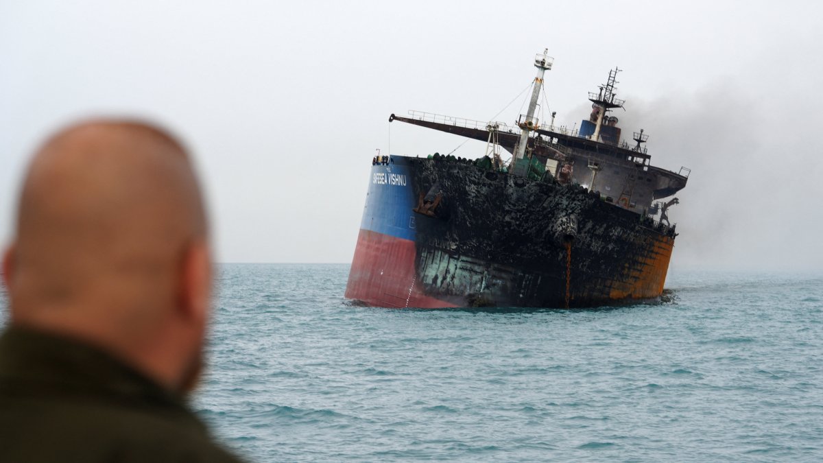 A foreign tanker carrying Iraqi fuel oil was damaged after catching fire in Iraq's territorial waters near Basra, Iraq, March 12, 2026. (Reuters Photo)