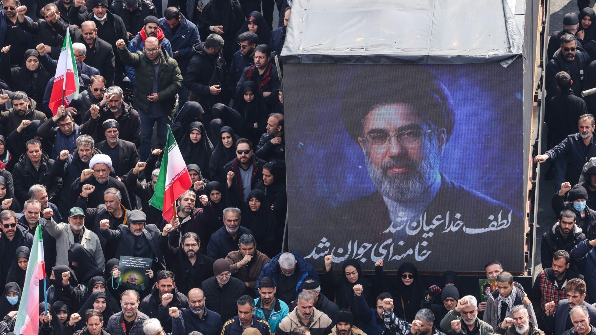 A screen displays a portrait of Iran's new supreme leader, Mojtaba Khamenei, during the funerals of IRGC commanders, Tehran, Iran, March 11, 2026. (AFP Photo)