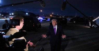 U.S. President Donald Trump speaks to the press after landing on Air Force One, Joint Base Andrews, Maryland, U.S., March 11, 2026. (AFP Photo)
