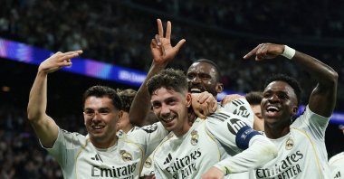 Real Madrid's Federico Valverde (C) celebrates with teammates after scoring the team's third goal during the UEFA Champions League round of 16 first-leg match against Manchester City at Santiago Bernabeu, Madrid, Spain, March 11, 2026. (Reuters Photo)
