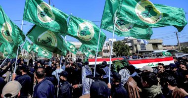 Mourners attend a funeral for members of Iraq's Hashed al-Shaabi, or the Popular Mobilisation Forces (PMF) – an alliance of factions now integrated into the regular army that also includes powerful Iran-backed groups – who were killed in reported strikes on Kirkuk, Iraq, March 10, 2026. (AFP Photo)