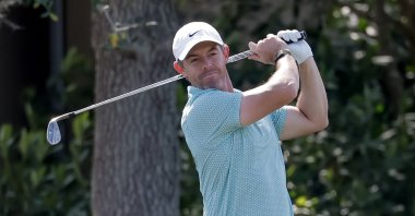 Rory McIlroy of Northern Ireland reacts while taking some swings in the practice area during the final practice round for The Players Championship golf tournament at TPC Sawgrass in Ponte Vedra Beach, U.S., March 11, 2026. (EPA Photo)