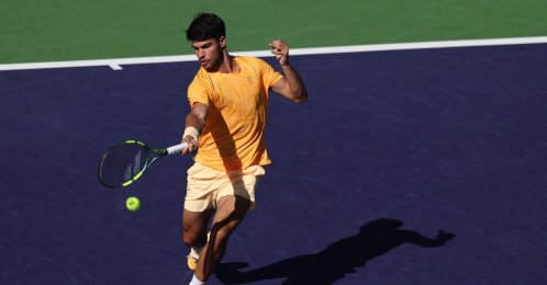 Carlos Alcaraz of Spain plays a forehand against Norway's Casper Ruud during their fourth-round match at the BNP Paribas Open at the Indian Wells Tennis Garden, Indian Wells, U.S., March 11, 2026. (AFP Photo)