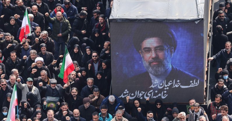 A screen displays a portrait of Iran's new supreme leader, Mojtaba Khamenei, during the funerals of IRGC commanders, Tehran, Iran, March 11, 2026. (AFP Photo)