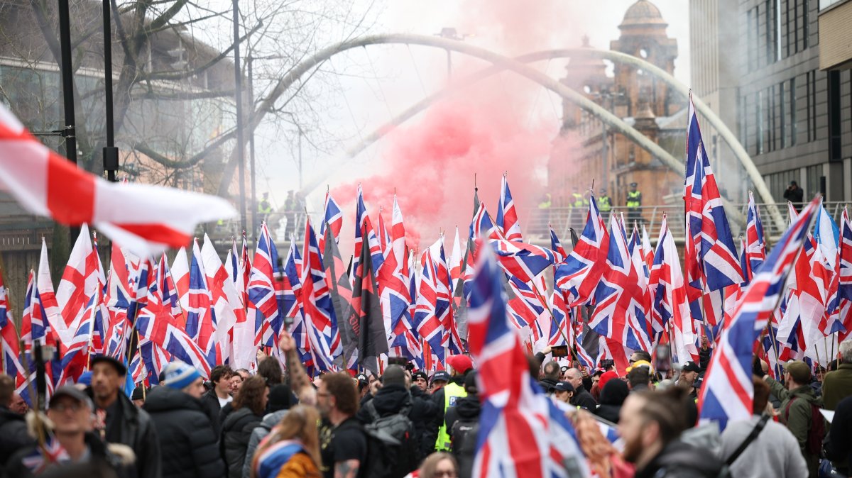Protesters take part in a "March for Remigration" organized by far-right group Britain First, Manchester, Britain, Feb. 21, 2026. (EPA Photo)