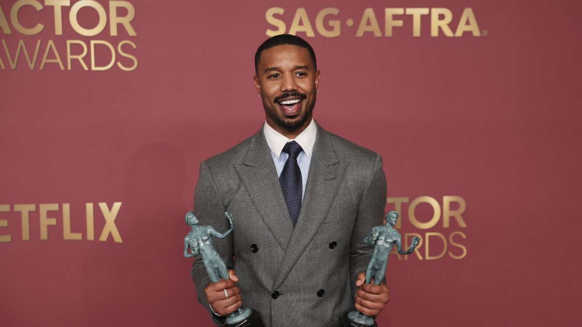Michael B. Jordan poses with the Outstanding Performance by a Male Actor in a Leading Role award and the Outstanding Performance by a Cast in a Motion Picture award for "Sinners" during the Actor Awards, in Los Angeles, California, U.S., March 1, 2026. (Reuters Photo)