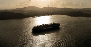 A cargo ship transits the Panama Canal in Panama City, March 12, 2026. (AP Photo)