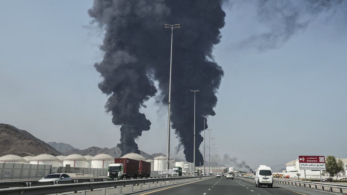 ]Smoke rises from the direction of an energy installation in what appears to be the latest Iranian strike, in the emirate of Fujairah, UAE, March 14, 2026. (AFP Photo)