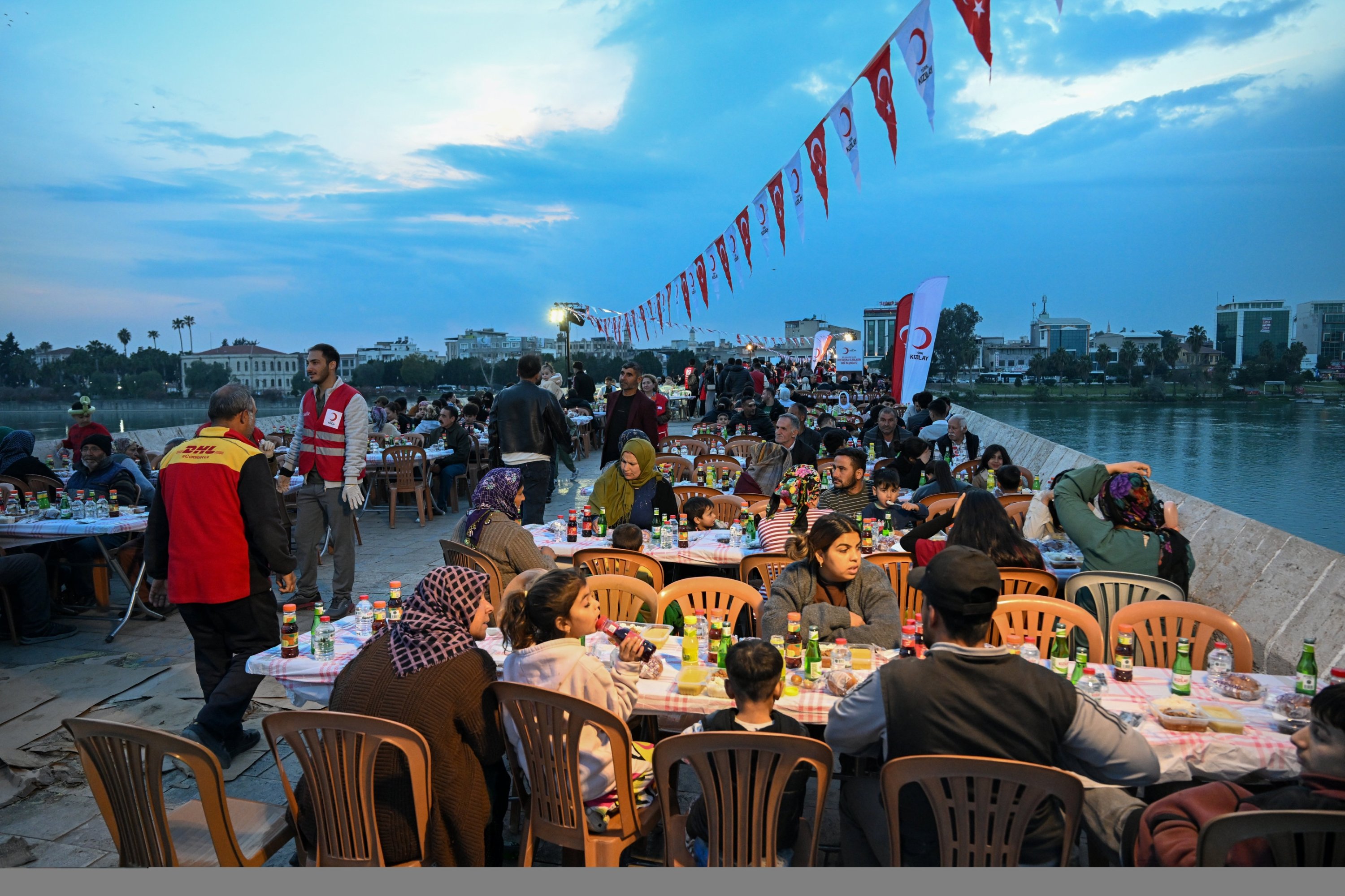 Thousands gather for a festive Ramadan iftar on the historic Stone Bridge, Adana, Türkiye, Adana, Türkiye, March 13, 2026. (AA Photo)
