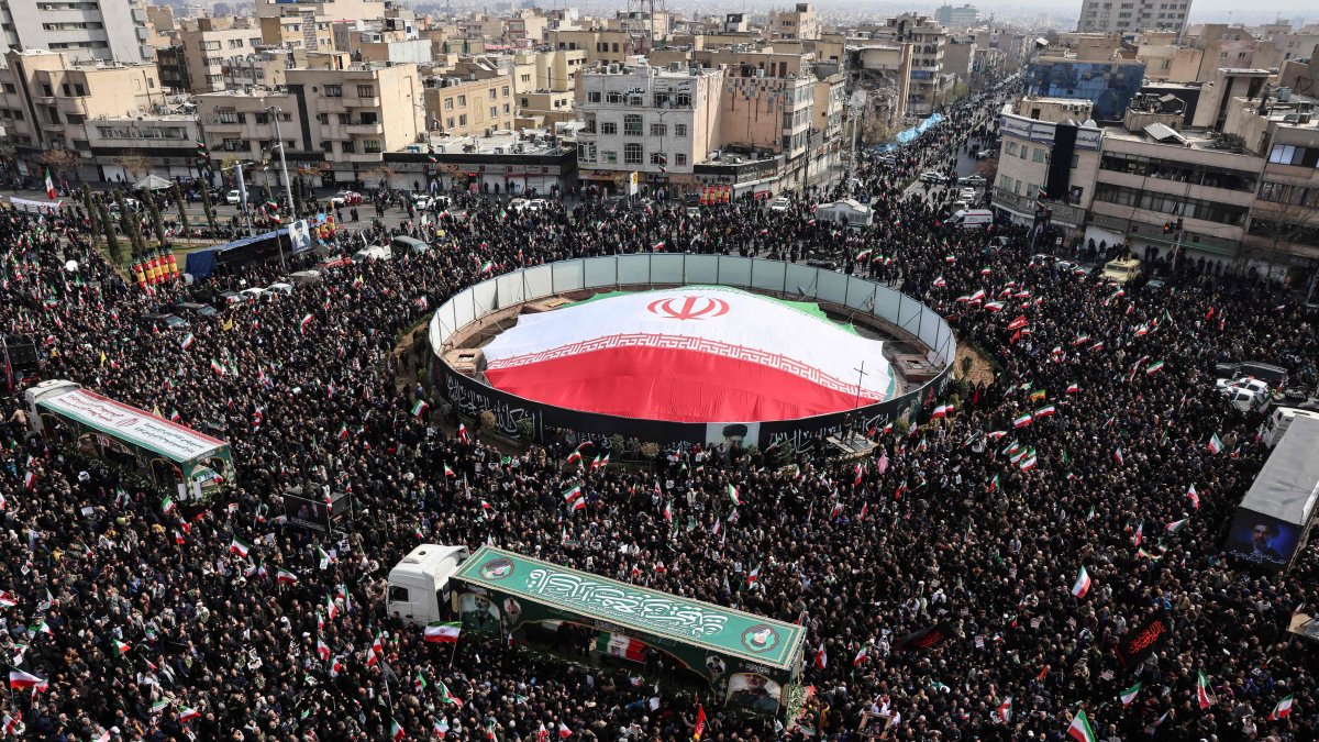 Iranians attend the funeral of Iran's Revolutionary Guards Corps (IRGC) commanders, army commanders and others killed in the early days of the U.S. and Israeli strikes on Iran, Enghelab Square, Tehran, Iran, March 11, 2026. (AFP Photo)