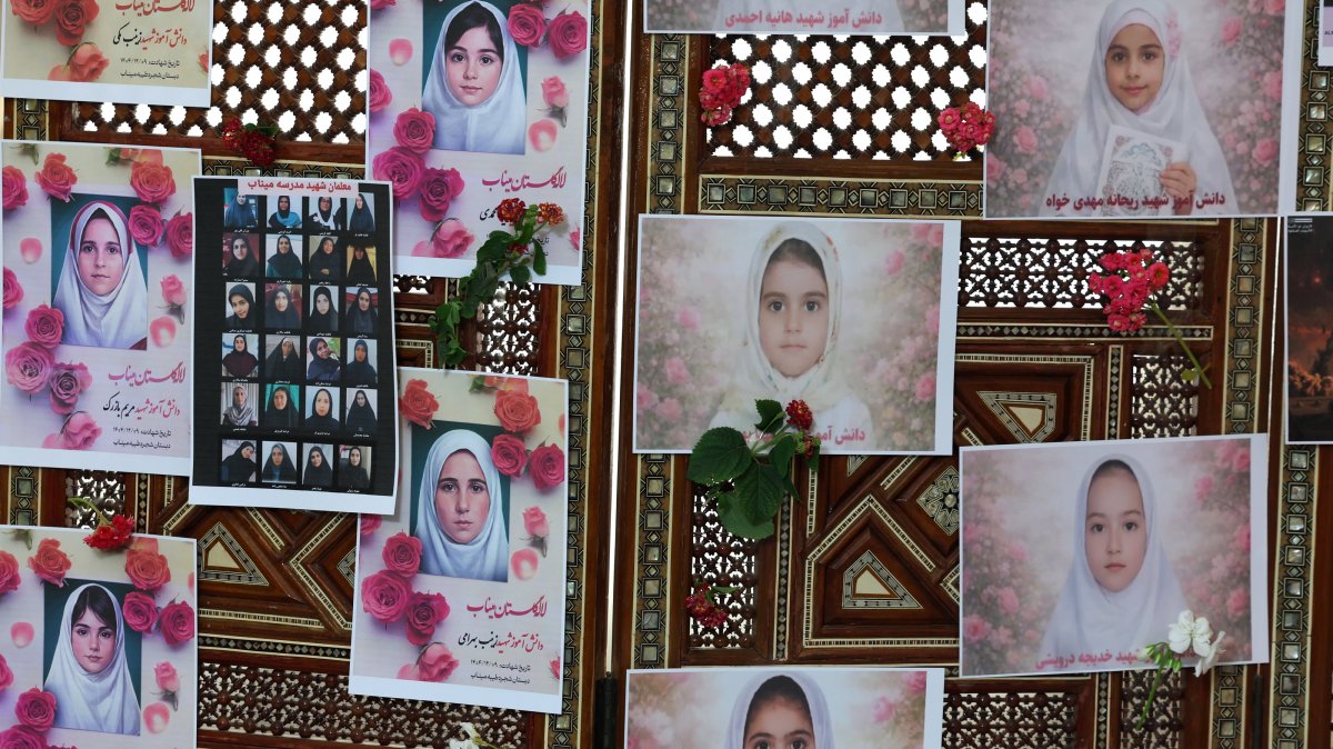 Photos of schoolchildren from the Shajarah Tayyebeh primary school who died in a bombing are displayed at the Iranian Embassy, Tunis, Tunisia, March 12, 2026. (EPA Photo)