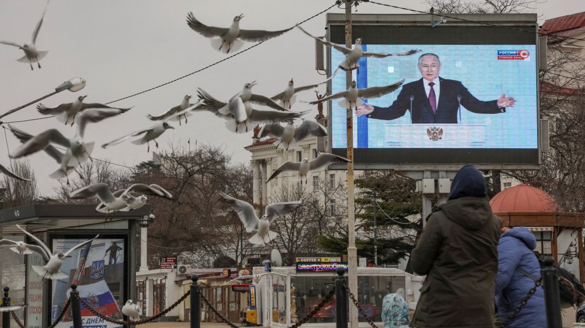 Russian President Vladimir Putin is seen on a screen during his annual address to the Federal Assembly, Sevastopol, Crimea, Ukraine, Feb. 21, 2023. (Reuters Photo)