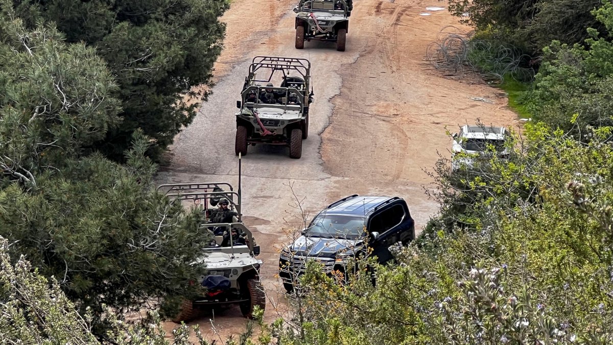Israeli soldiers in military vehicles congregate on the Israeli side of the Israel-Lebanon border, in northern Israel, March 16, 2026. (Reuters Photo)