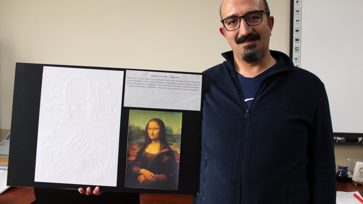 Cahit Şahin displays a tactile version of the Mona Lisa for visually impaired students, Aksaray, Türkiye, March 16, 2026. (DHA Photo)