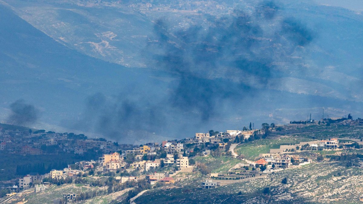 Smoke rises from the Lebanese village of Khiam after an Israeli strike as seen from the Upper Galilee in northern Israel, March 16, 2026. (AFP Photo)