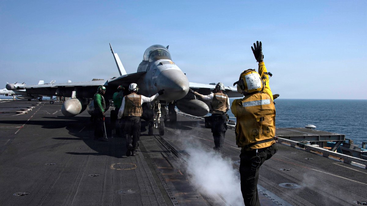An EA-18G Growler, attached to Electronic Attack Squadron (VAQ) 133, as it prepares to launch from the flight deck of Nimitz-class aircraft carrier USS Abraham Lincoln (CVN 72) in support of Operation Epic Fury, March 7, 2026. (US Navy Handout via AFP)