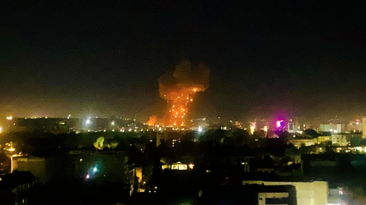 This photograph shows smoke and flames rising from an area hit by airstrikes, in Kabul on March 16, 2026. (AFP Photo)