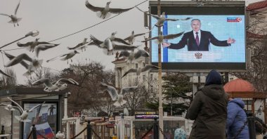 Russian President Vladimir Putin is seen on a screen during his annual address to the Federal Assembly, Sevastopol, Crimea, Ukraine, Feb. 21, 2023. (Reuters Photo)