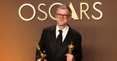 Paul Thomas Anderson, winner of the Best Adapted Screenplay, Best Director and Best Picture Awards for “One Battle After Another” poses in the press room at the 98th annual Academy Awards, Los Angeles, California, U.S., March 15, 2026. (EPA Photo)