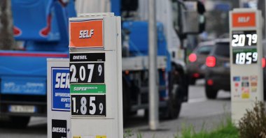 The price per liter of unleaded petrol and diesel fuels are pictured outside a petrol station, Monza, Italy, March 11, 2026. (AFP Photo)