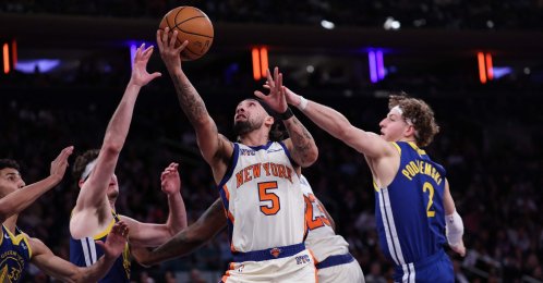New York Knicks' Jose Alvarado attempts a layup defended by Golden State Warriors' Brandin Podziemski during the fourth quarter at Madison Square Garden, New York City, U.S., March 15, 2026. (AFP Photo)
