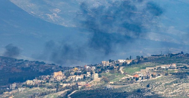 Smoke rises from the Lebanese village of Khiam after an Israeli strike as seen from the Upper Galilee in northern Israel, March 16, 2026. (AFP Photo)