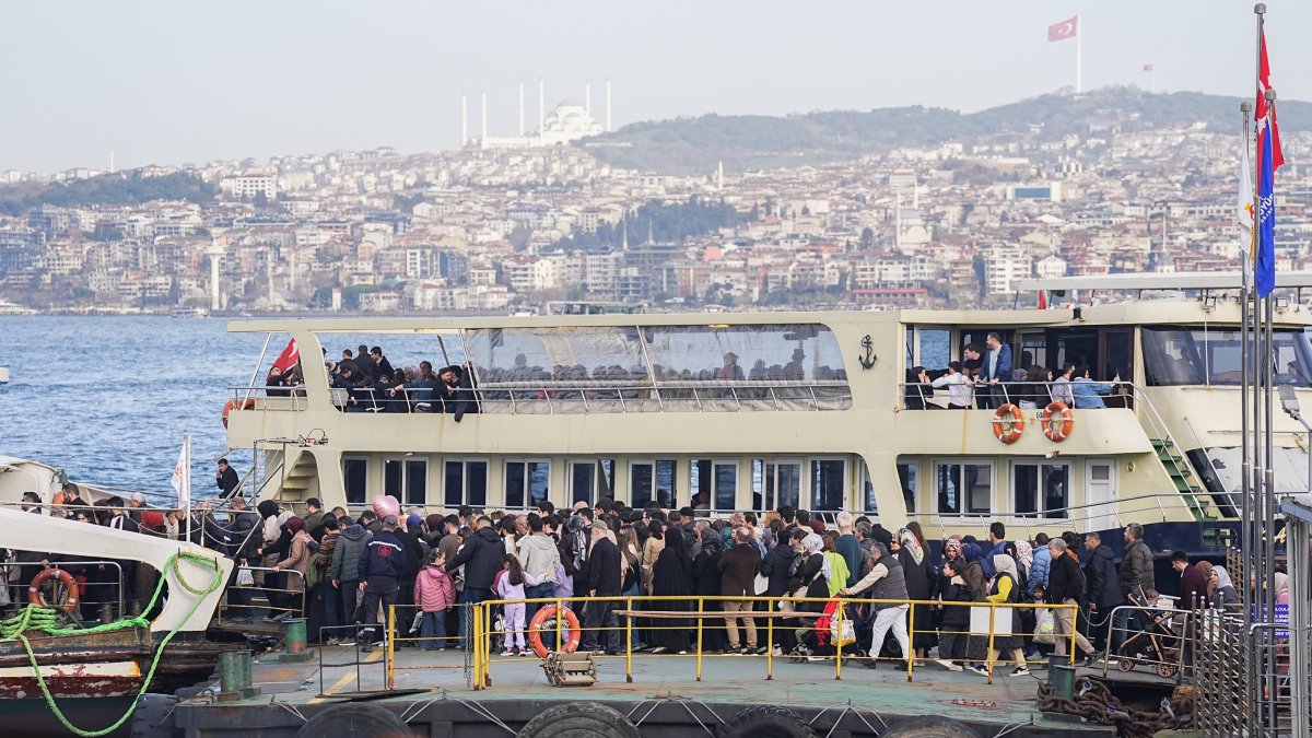 People are seen boarding a ship on a sunny day in Istanbul, Türkiye, Feb. 15, 2026. (AA Photo)