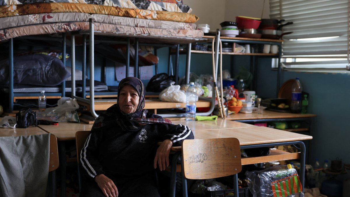A woman looks on at school turned into a shelter for displaced families, following Israel's attacks on Lebanon, Beirut, Lebanon, March 17, 2026. (Reuters Photo)