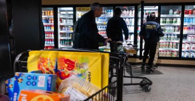 People shop at a grocery store in Manhattan, New York City, U.S., Feb. 27, 2026. (AFP Photo)