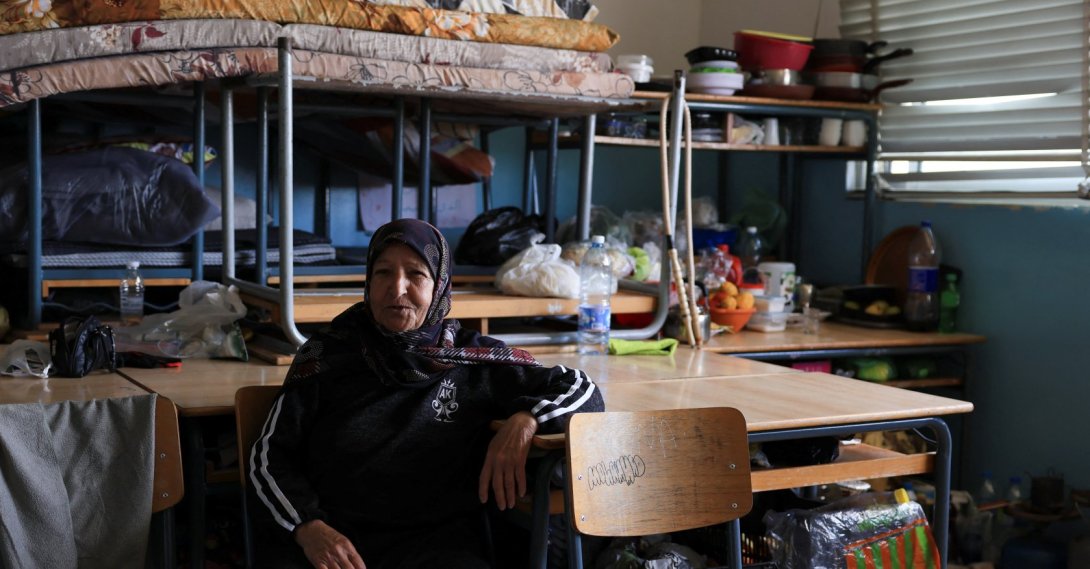 A woman looks on at school turned into a shelter for displaced families, following Israel's attacks on Lebanon, Beirut, Lebanon, March 17, 2026. (Reuters Photo)