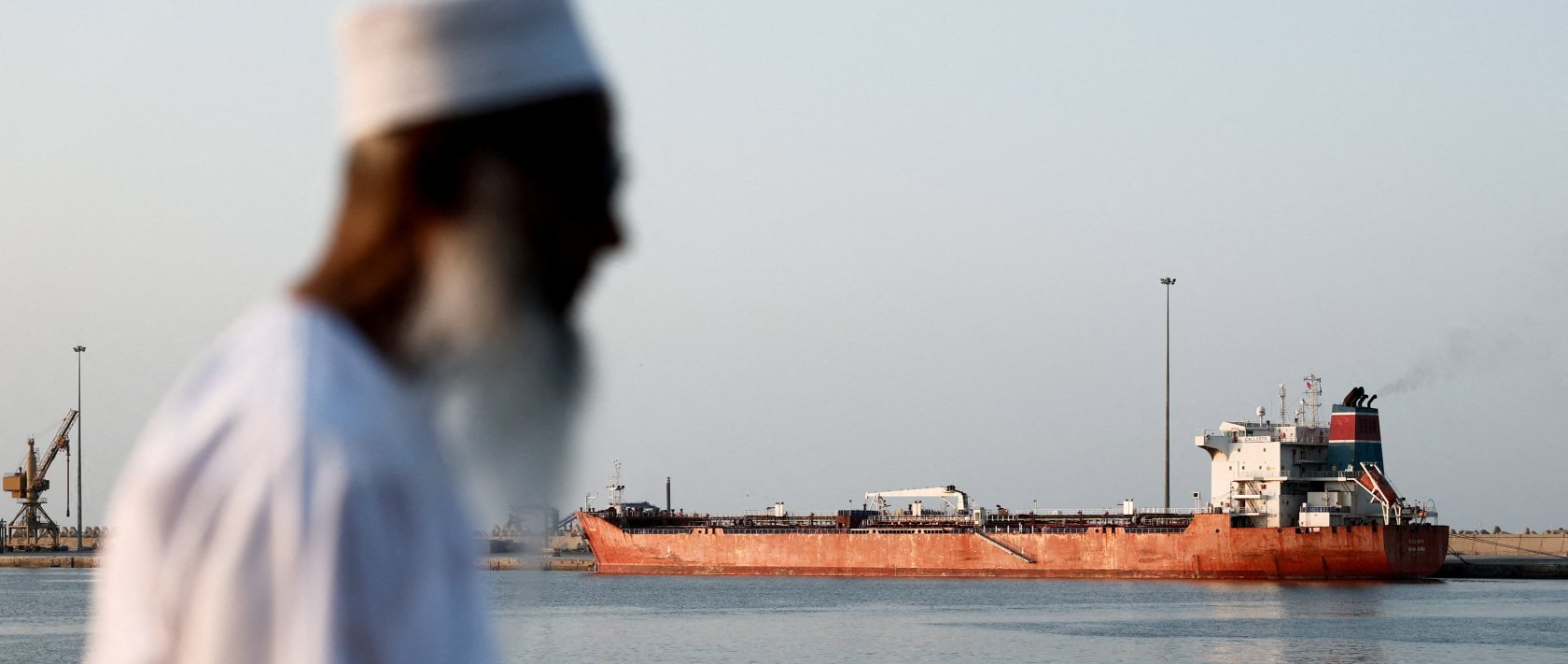 A tanker sits anchored in the Port Sultan Qaboos as the traffic is down in the Strait of Hormuz, amid the U.S.-Israeli conflict with Iran, Muscat, Oman, March 12, 2026. (Reuters Photo)