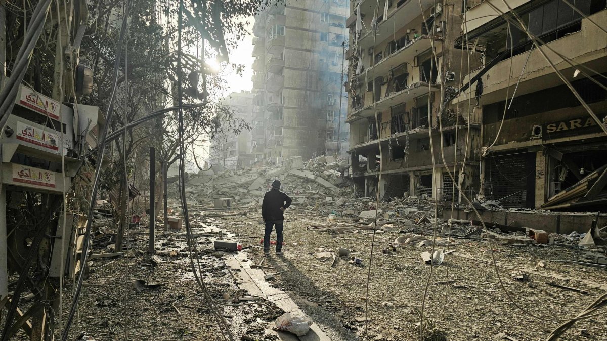 A man looks at the site of overnight Israeli airstrikes in the southern suburbs of Beirut, Lebanon, March 12, 2026. (AFP Photo)