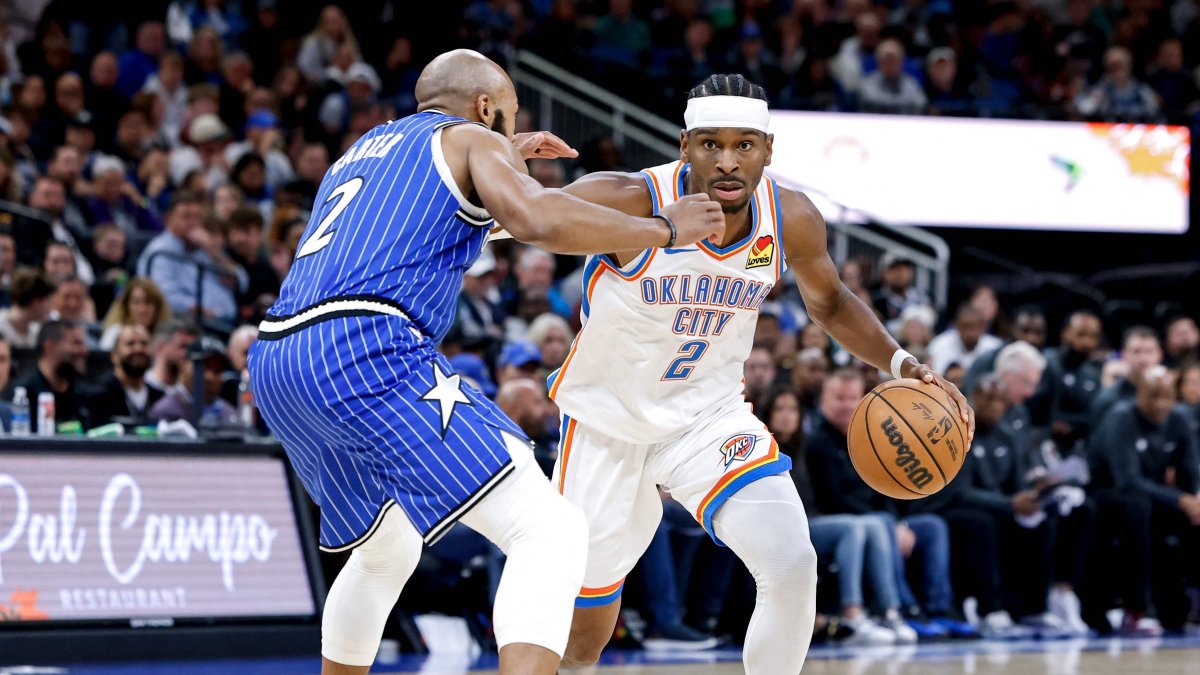 Oklahoma City Thunder guard Shai Gilgeous-Alexander controls the ball against Orlando Magic guard Jevon Carter at midcourt during the second half at Kia Center, Orlando, U.S., March 17, 2026. (AFP Photo)