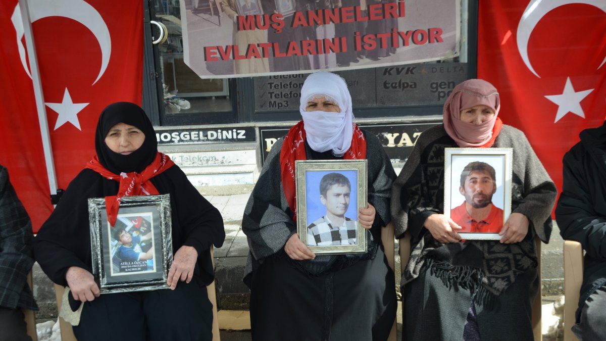 Mothers hold the photos of their children brainwashed by the PKK as they stage a protest, Muş, eastern Türkiye, March 18, 2026. (AA Photo)

