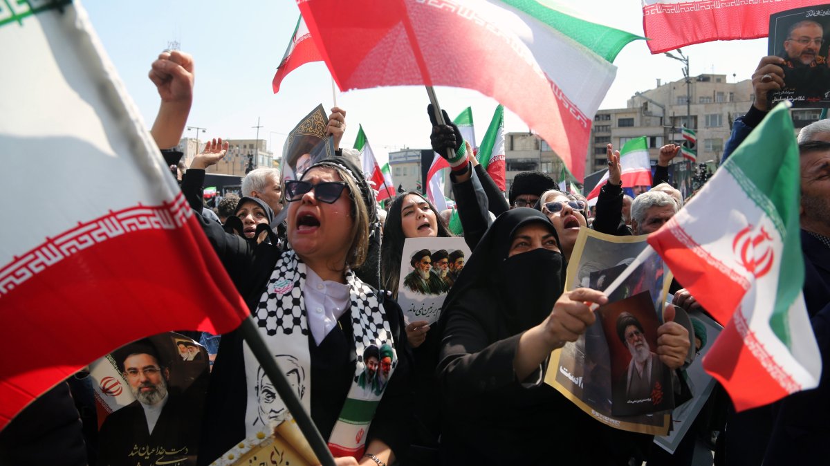 Mourners rally during a funeral procession for Iranian security cheif Ali Larijani, in Tehran, Iran, March 18, 2026. (AA Photo)