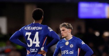 Chelsea's Alejandro Garnacho (R) looks dejected after the UEFA Champions League round of 16 second-leg match against Paris Saint-Germain at Stamford Bridge, London, U.K., March 17, 2026. (Reuters Photo)

