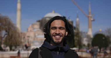 Roberto poses for a photo near Hagia Sofia Grand Mosque during Ramadan, Istanbul, Türkiye, March 17, 2026. (AA Photo)