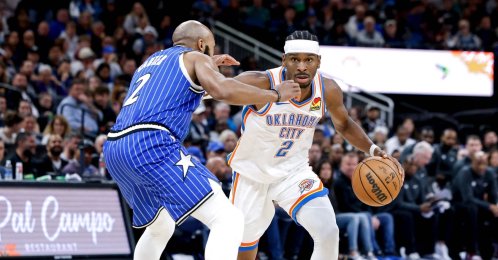 Oklahoma City Thunder guard Shai Gilgeous-Alexander controls the ball against Orlando Magic guard Jevon Carter at midcourt during the second half at Kia Center, Orlando, U.S., March 17, 2026. (AFP Photo)