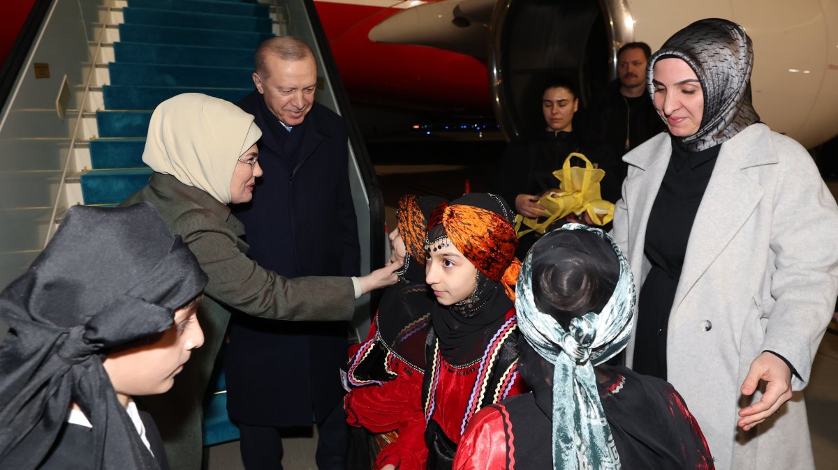 President Recep Tayyip Erdoğan and first lady Emine Erdoğan are welcomed by children as they arrive in Rize, Erdoğan's hometown, to spend Eid al-Fitr, Rize, Türkiye, March 18, 2026. (AA Photo)